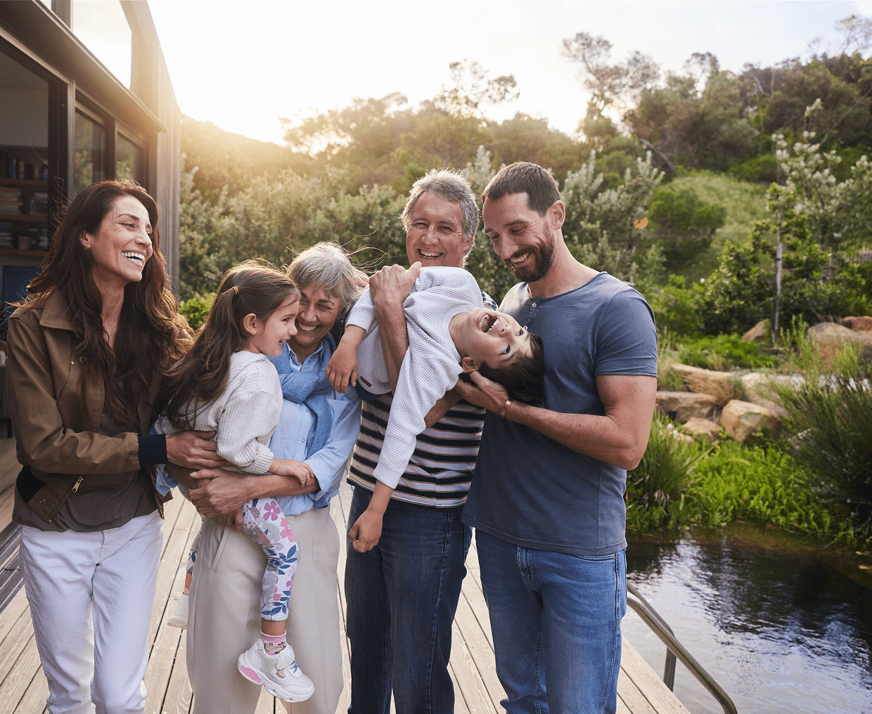 Multigenerational family smiling and laughing