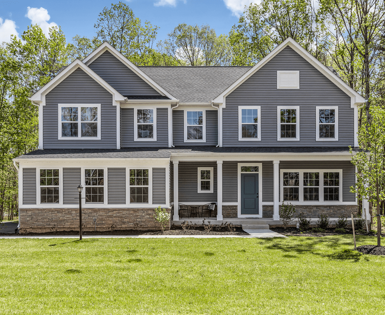 Spacious suburban home with green lawn