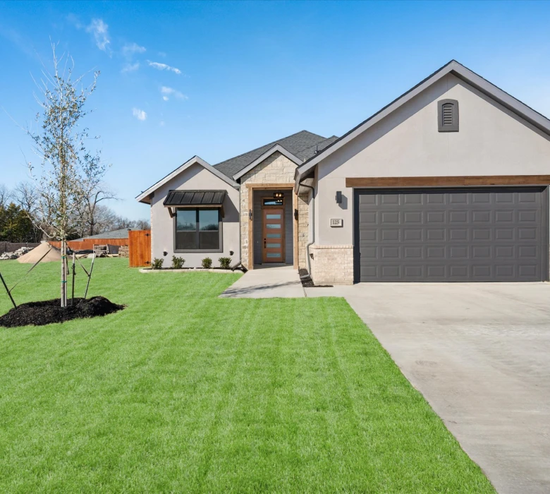 Contemporary home exterior with garage